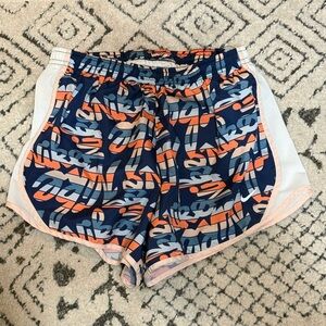 Nike Youth Large girls graphic patterned Shorts blue orange peach liner